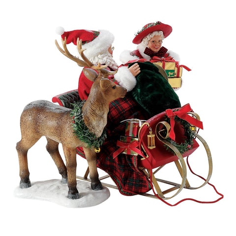 Department 56 Possible Dreams Babbo e Mamma Natale "Riempire la Slitta" 36x25.5xH27 cm