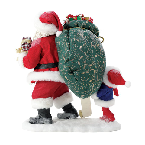Department 56 Statuina Babbo Natale con sacco regali "Sharing The Load" 25x15xH25 cm