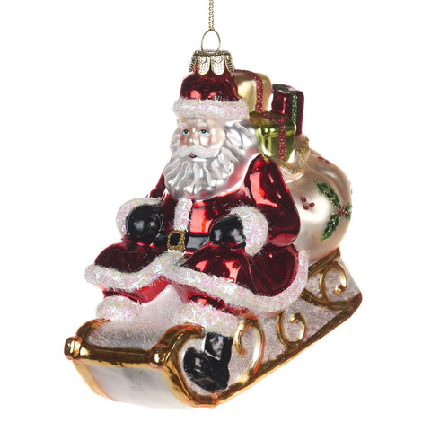 GOODWILL Babbo Natale su slitta in vetro con glitter 12.5 cm