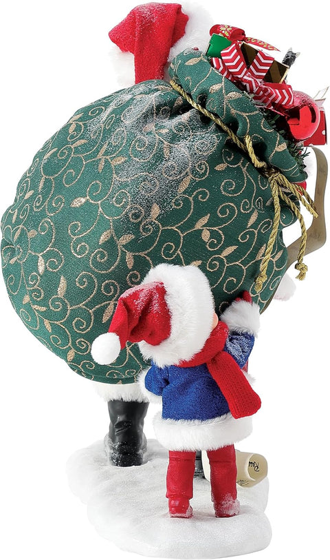 Department 56 Statuina Babbo Natale con sacco regali "Sharing The Load" 25x15xH25 cm