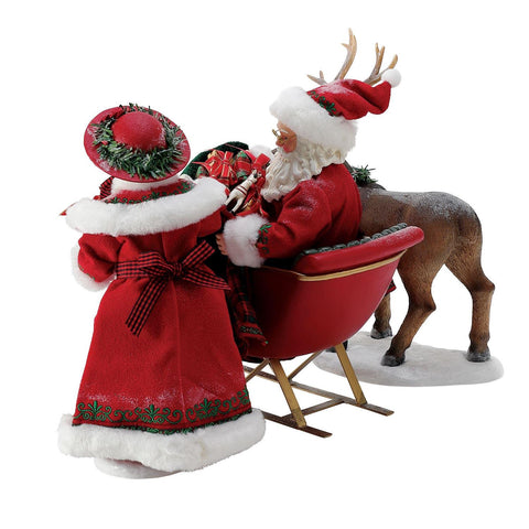 Department 56 Possible Dreams Babbo e Mamma Natale "Riempire la Slitta" 36x25.5xH27 cm