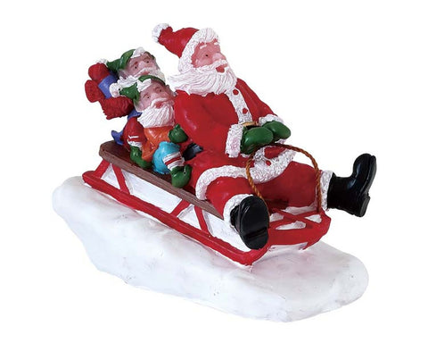 LEMAX Personaggio Babbo Natale con elfi "Sledding With Santa" H6x4.2x7.8 cm
