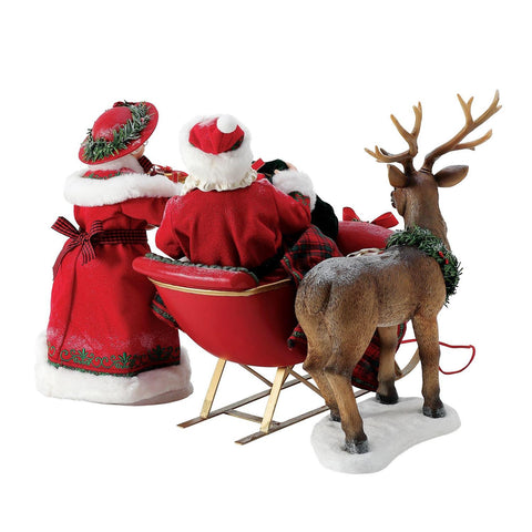 Department 56 Possible Dreams Babbo e Mamma Natale "Riempire la Slitta" 36x25.5xH27 cm
