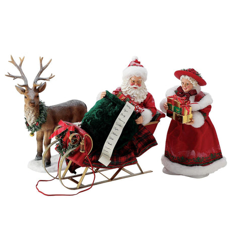 Department 56 Possible Dreams Babbo e Mamma Natale "Riempire la Slitta" 36x25.5xH27 cm