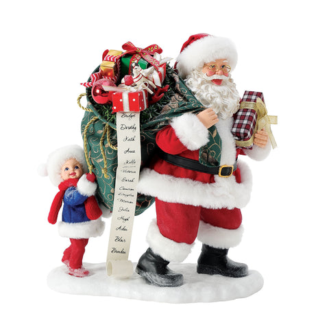 Department 56 Statuina Babbo Natale con sacco regali "Sharing The Load" 25x15xH25 cm