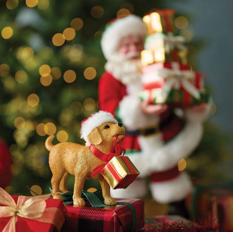 Department 56 Statuina Babbo natale in resina con cagnolino "Furry Helper" 17.5x14xH26.5 cm