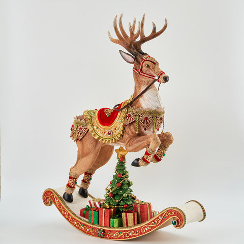GOODWILL Christmas figurine Reindeer on rocking chair with gifts in resin