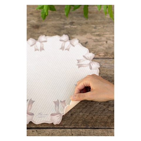 Blanc Mariclò Set of two round pink vinyl placemats "Bow" 33x33 cm