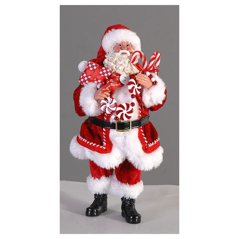 Figurine VETUR Père Noël avec cannes à sucre en résine H26 cm