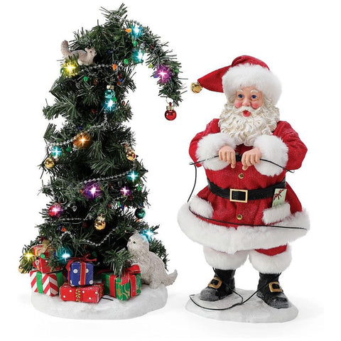 Département 56 Rêves possibles Père Noël en résine avec arbre lumineux LED