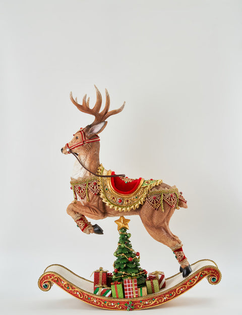 GOODWILL Christmas figurine Reindeer on rocking chair with gifts in resin