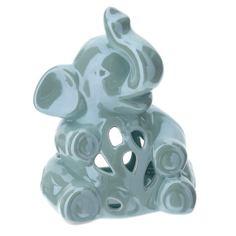 HERVIT Bougeoir éléphant percé support porcelaine bleu clair H14 cm