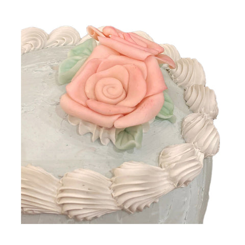 I DOLCI DI NAMI Gâteau avec décoration artisanale bleu clair et rose crème Ø21 H16 cm