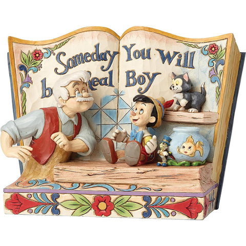 Figurine Enesco Pinocchio et Geppetto "Un jour, tu seras un vrai garçon"