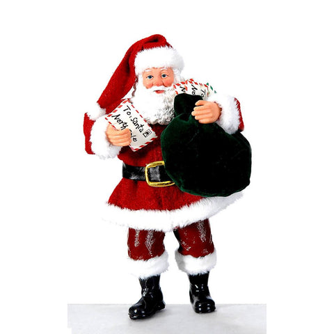 Figurine VETUR Père Noël avec sac plein de cadeaux en résine H20cm